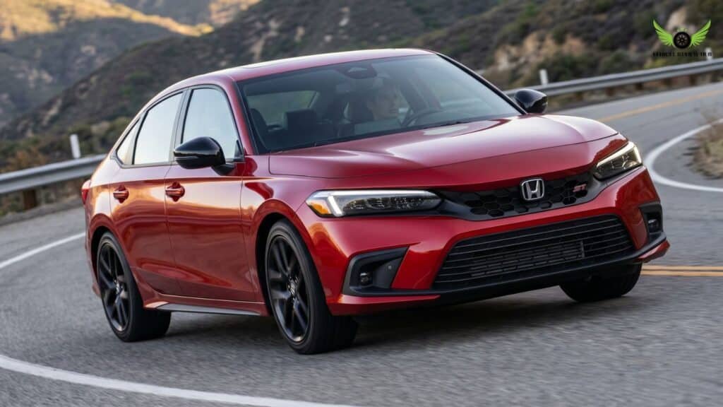 Honda Civic Sedan Sport Hybrid cornering on a winding road
