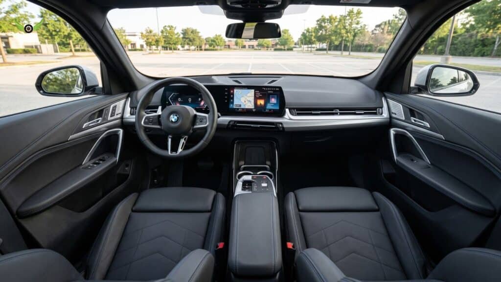 Interior of the 2026 BMW X1 showing dashboard, seats and digital cockpit.