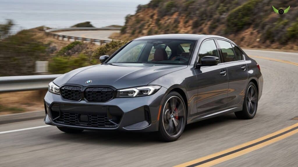 2026 BMW 3 Series driving through a corner to demonstrate performance and handling